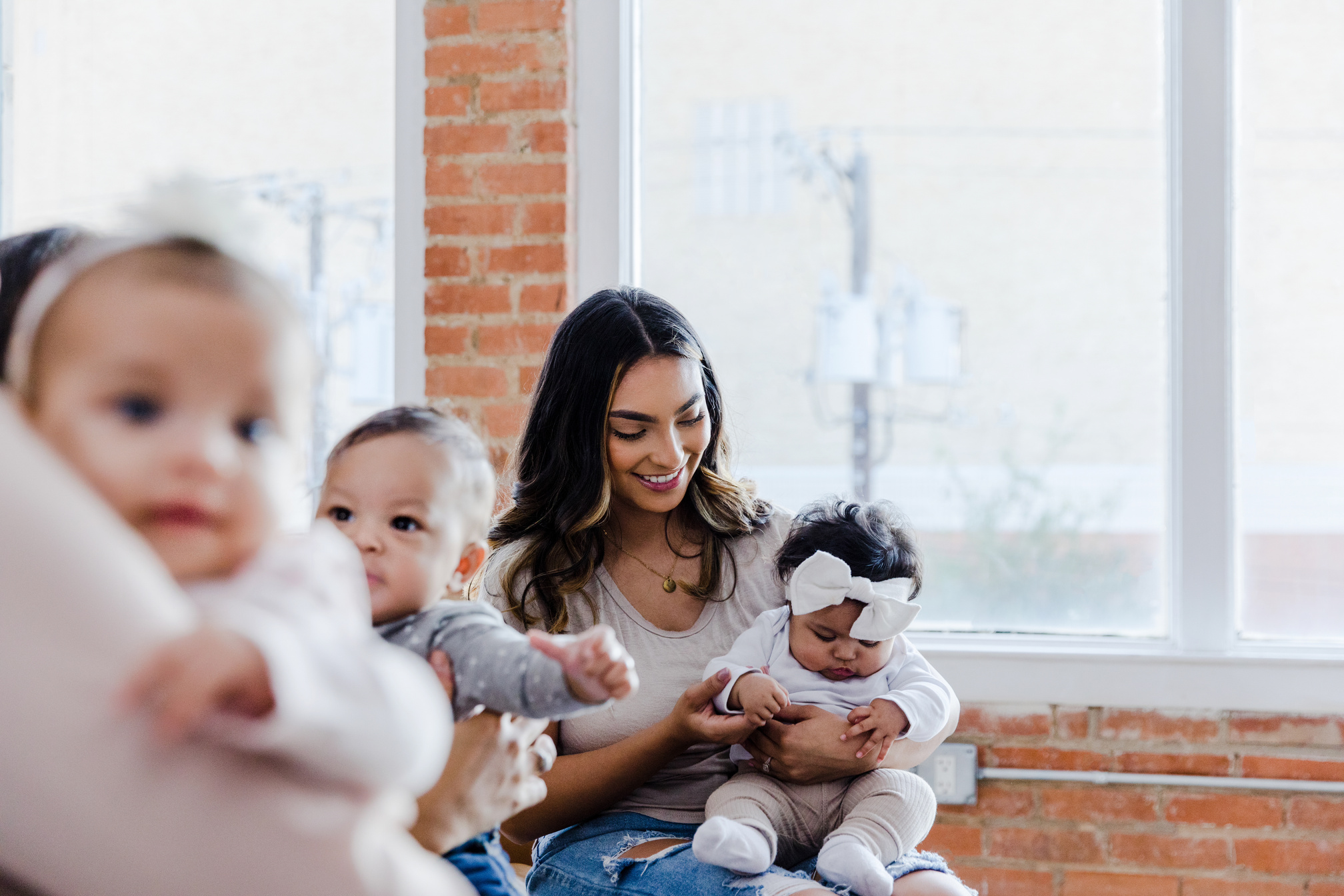 Moms and babies attend group therapy